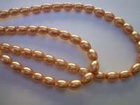 Glass Pearls Oval Shiny 7mm x 9mm